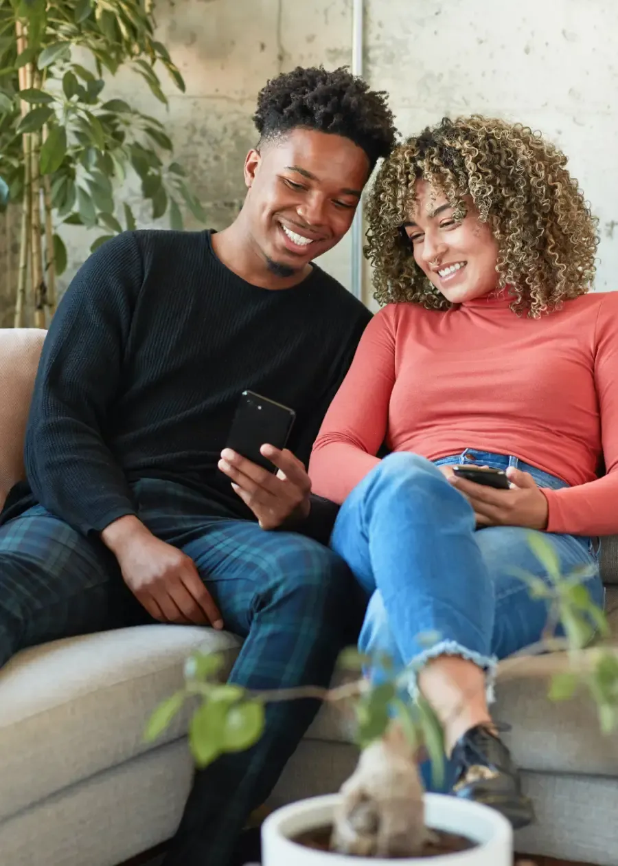 Two friends checking a KnoxxPay payment on their phones